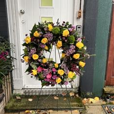 Yellow and Lilac Wreath on a stand