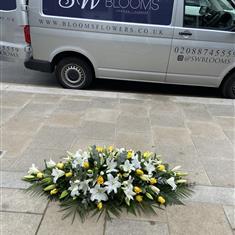 Yellow Roses and White Oriental Lily Coffin Spray
