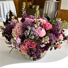 Purple Blossoms Globe Vase Arrangement
